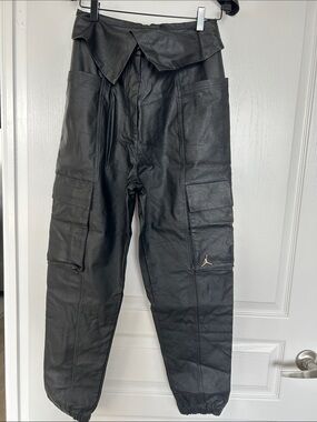 Air Jordan Black Cargo Faux Leather Trousers with Gold Logo